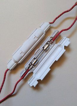 Запобіжник мікрохвильової печі 5kV-0,75A, Б/У 10759 фото