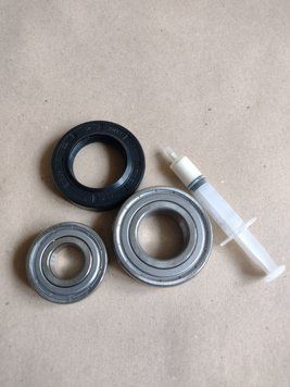 Для Bosch/Siemens Комплект підшипників SKF 6203+6205 + сальник (32*52*10/12 mm/мм) + мастило для пральної машини 13172 фото