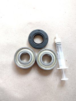 Для AEG/Electrolux/Zanussi Комплект підшипників SKF 6203+6203 + сальник (20*40*7 mm/мм) + мастило для пральної машини 12134 фото